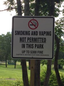 Tobacco Web Page Smoke Free Signage 2021 A sign forbidding smoking and vaping at a local park.